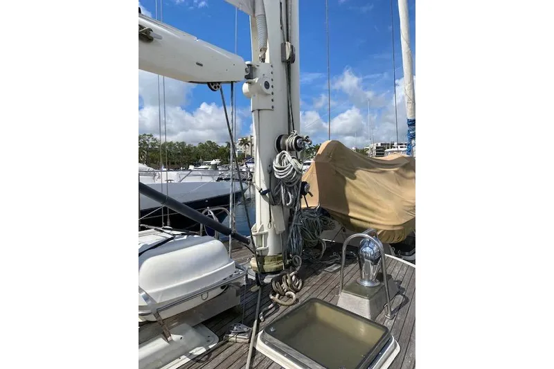 Slide: The Image of 1990 Little Harbor Sloop 58' deck with rigging and covered equipment. - 45