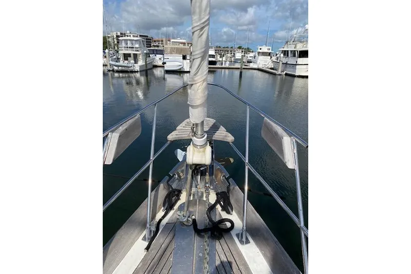 Slide: The Image of Bow view of 1990 Little Harbor Sloop 58' docked in a marina. - 47