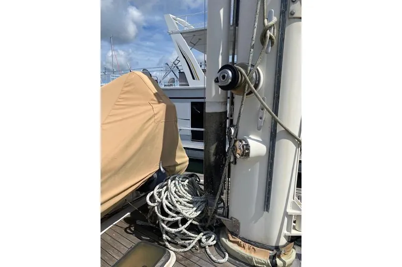 Slide: The Image of Close-up of a 1990 Little Harbor Sloop 58' mast with ropes and winch. - 52