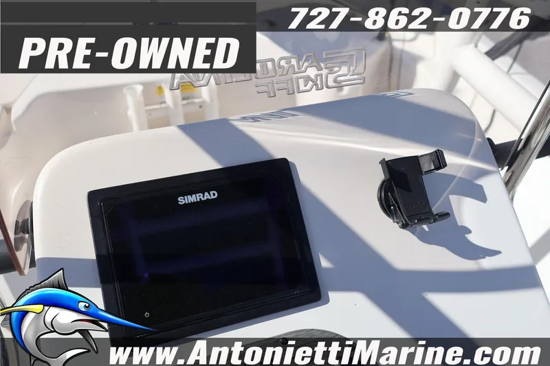 Slide: The Image of Pre-owned 2016 Carolina Skiff 178 DLV boat dashboard with Simrad display. - 26