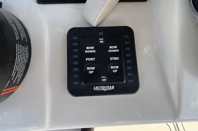 Slide: The Image of Control panel of a 2023 Sea Born LX24 Center Console boat. - 13