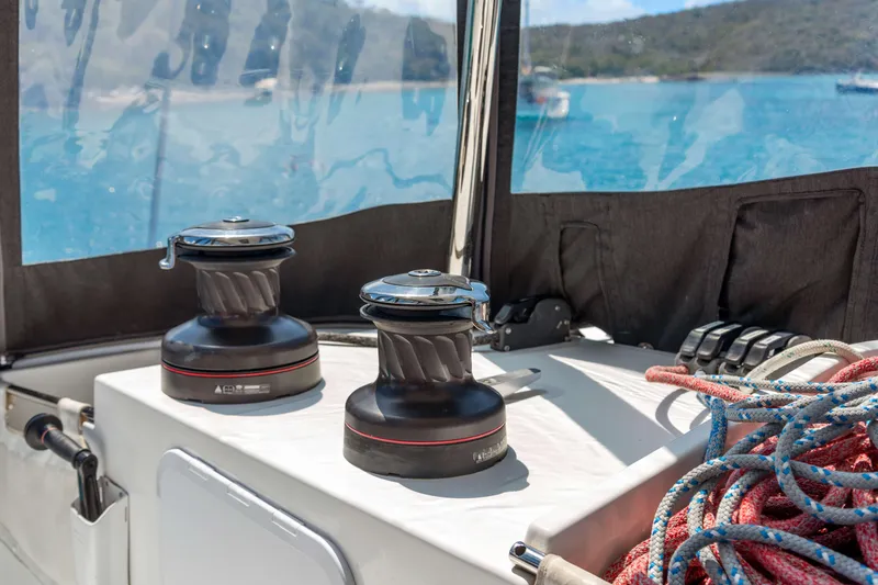 Slide: The Image of Winches and ropes on a 2017 Lagoon 450 F catamaran deck, with scenic ocean view. - 28