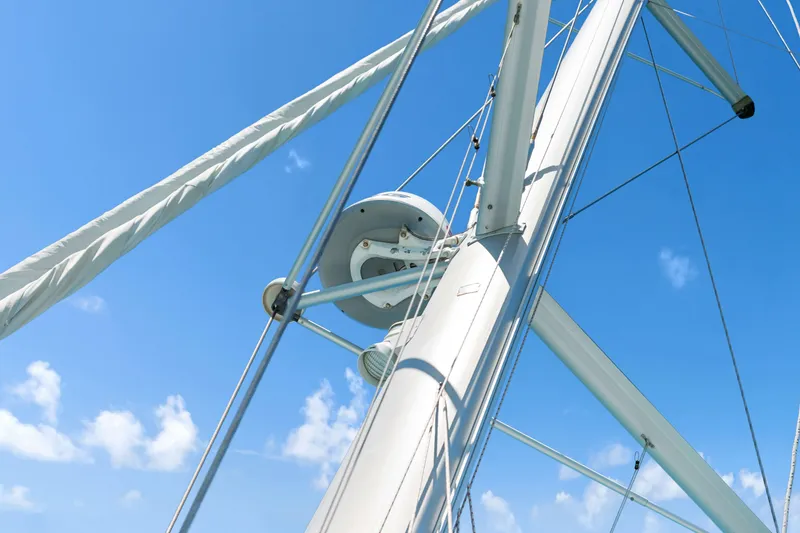Slide: The Image of Mast and rigging of 2017 Lagoon 450 F catamaran against clear blue sky. - 29