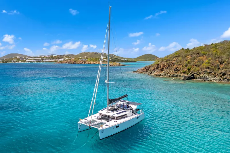 Slide: The Image of Lagoon 450 F catamaran sailing in clear turquoise waters, 2017 model. - 3