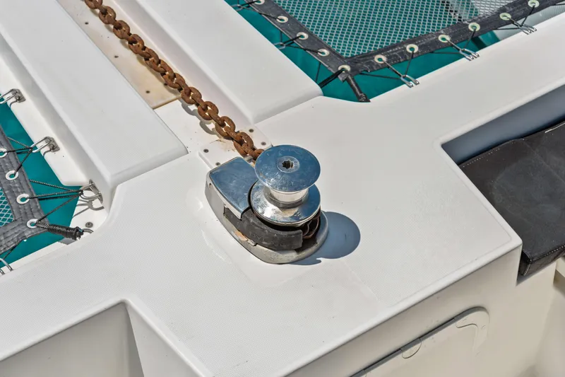 Slide: The Image of Deck of 2017 Lagoon 450 F catamaran with anchor chain and winch. - 32