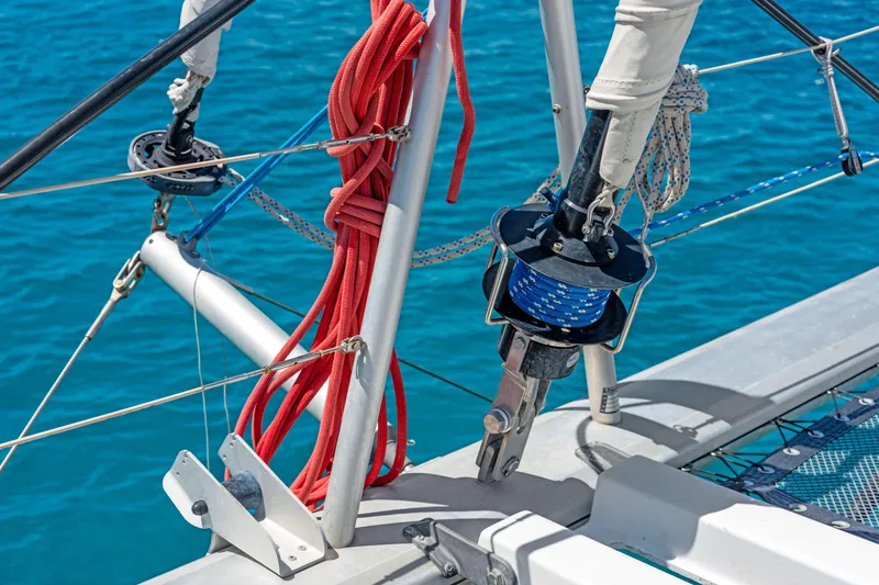 Slide: The Image of Close-up of 2017 Lagoon 450 F sailboat rigging and ropes on blue water. - 33