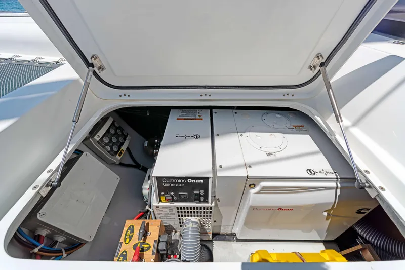 Slide: The Image of Engine compartment of 2017 Lagoon 450 F catamaran with Cummins Onan generator. - 35