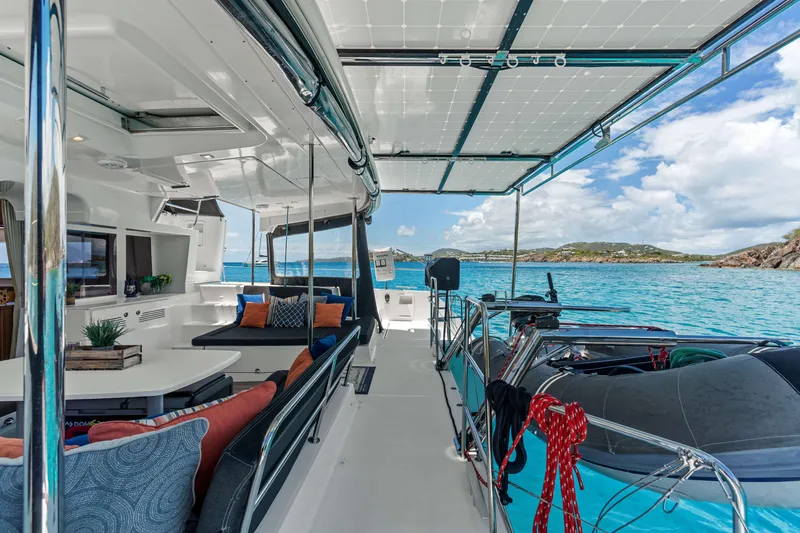 Slide: The Image of Luxurious 2017 Lagoon 450 F catamaran interior with ocean view, featuring modern seating and decor. - 39