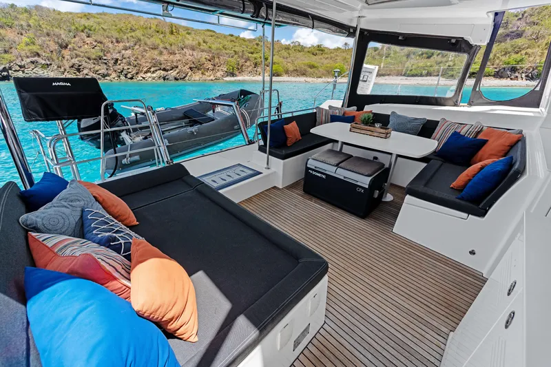 Slide: The Image of Luxurious Lagoon 450 F catamaran interior, 2017 model, with plush seating and scenic ocean view. - 42