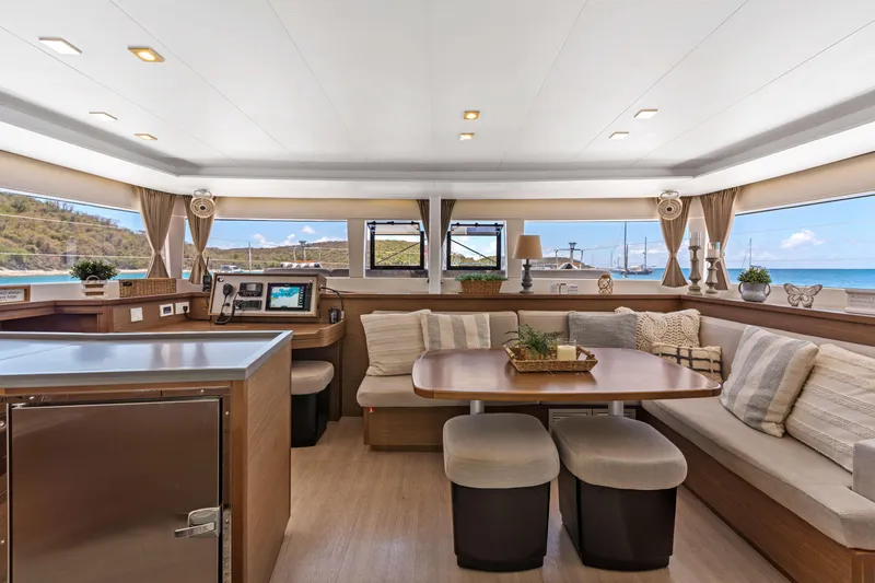 Slide: The Image of Luxurious interior of 2017 Lagoon 450 F catamaran with elegant seating and ocean view. - 48