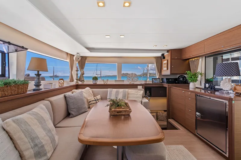Slide: The Image of Luxurious interior of 2017 Lagoon 450 F catamaran with elegant furnishings and ocean view. - 50