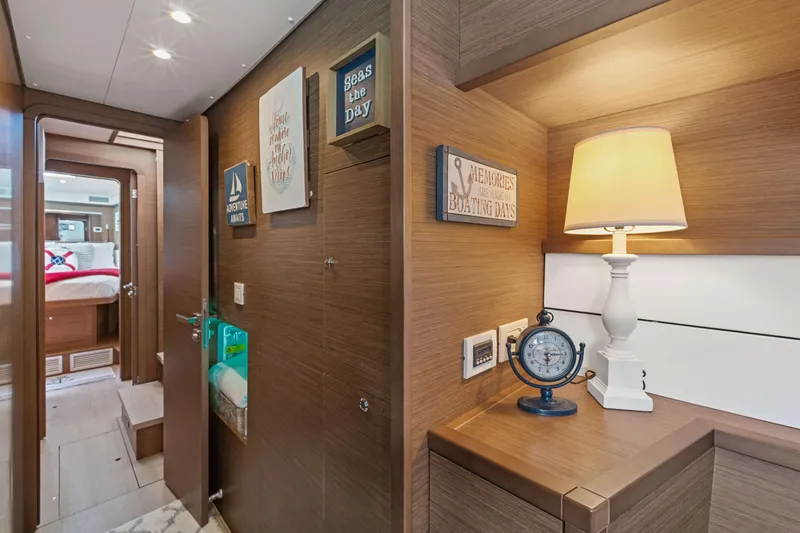 Slide: The Image of Interior of 2017 Lagoon 450 F yacht with nautical decor and cozy lighting. - 58