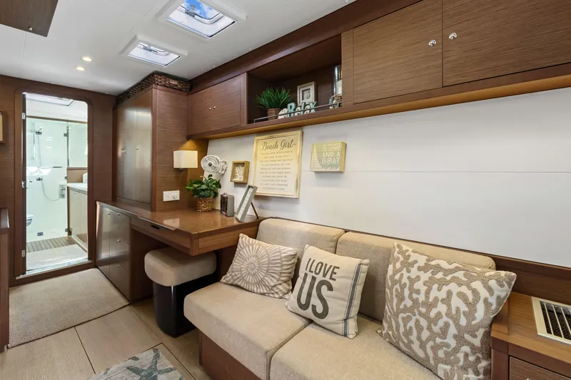 Slide: The Image of Interior of 2017 Lagoon 450 F yacht with cozy seating and decorative accents. - 64