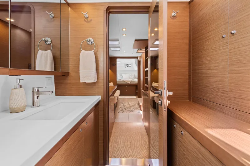 Slide: The Image of Luxurious interior of 2017 Lagoon 450 F yacht, featuring elegant wood finishes and modern amenities. - 67