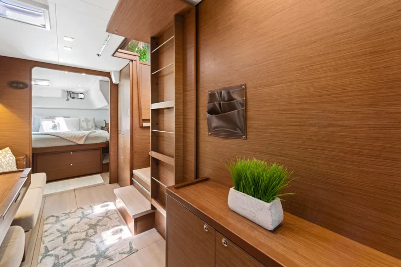 Slide: The Image of Luxurious interior of 2017 Lagoon 450 F catamaran with modern wood finish and cozy bedroom. - 69