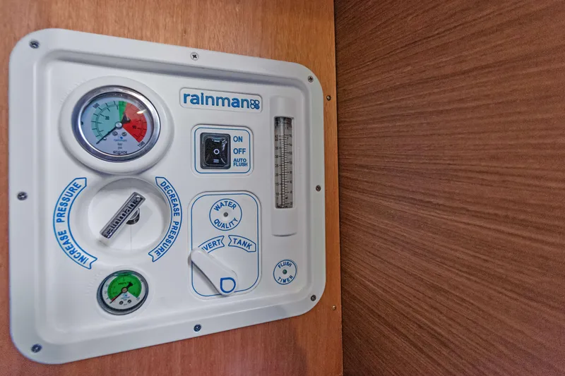 Slide: The Image of Rainman watermaker control panel on 2017 Lagoon 450 F yacht interior. - 74