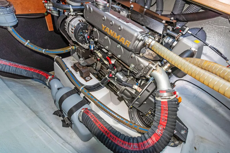 Slide: The Image of Engine compartment of a 2017 Lagoon 450 F catamaran with Yanmar engine. - 76