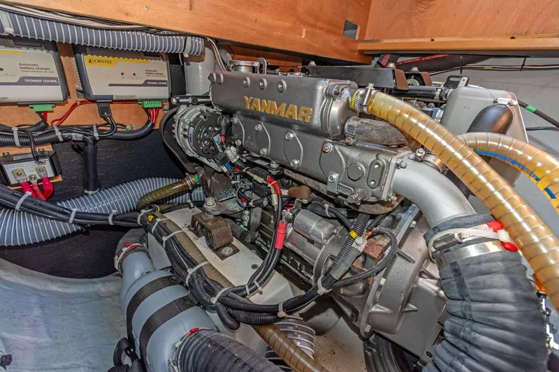 Slide: The Image of Engine room of 2017 Lagoon 450 F catamaran with Yanmar engine and battery chargers. - 81