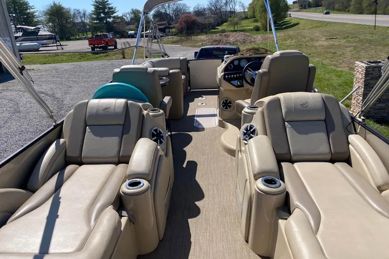Slide: The Image of Luxurious interior of 2016 Starcraft MX 23 L pontoon boat with plush seating. - 9