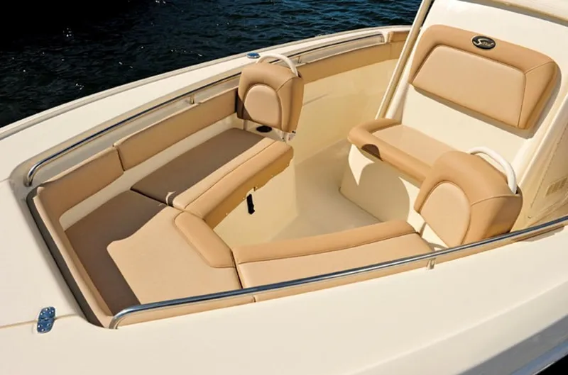Slide: The Image of Manufacturer Provided Image: 2017 Scout 225 XSF boat interior with tan seating and stainless steel railings. - 10