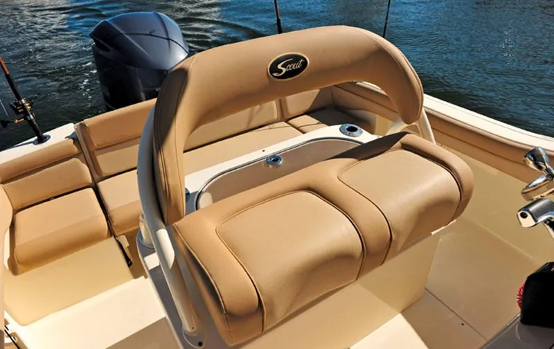 Slide: The Image of Manufacturer Provided Image: 2017 Scout 225 XSF boat interior with tan seating and outboard motor. - 12