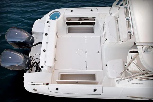 Slide: The Image of Manufacturer Provided Image: 2018 Robalo R305 Walkaround boat deck with twin outboard engines. - 9