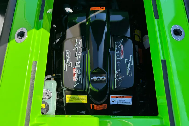 Slide: The Image of 2021 Moomba Kaiyen engine, Raptor 6.2L, vibrant green accents. - 25