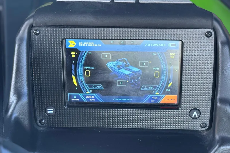 Slide: The Image of 2021 Moomba Kaiyen dashboard display showing Autowake settings and boat metrics. - 34
