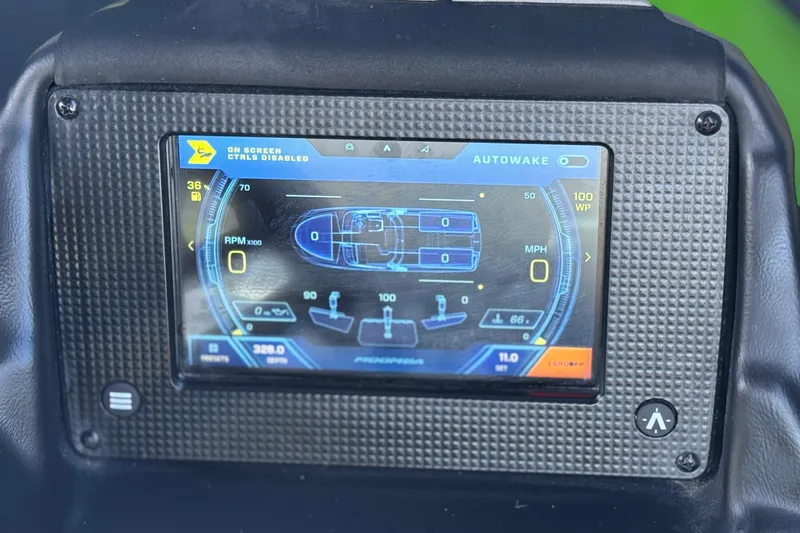 Slide: The Image of 2021 Moomba Kaiyen dashboard display showing Autowake system and boat controls. - 35