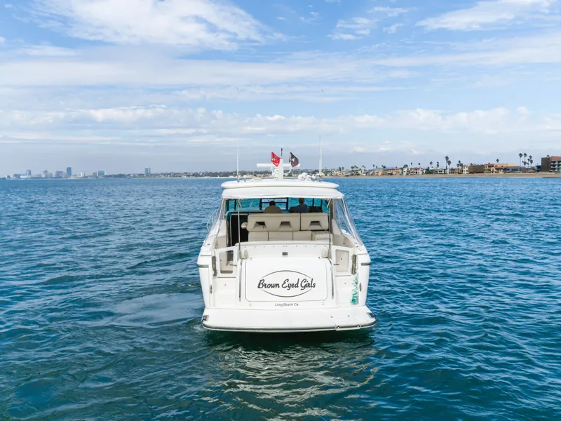 Slide: The Image of 2004 Tiara Yachts 4000 cruising on open water. - 10