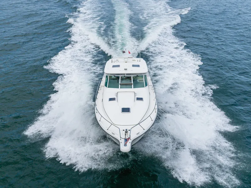 Slide: The Image of 2004 Tiara Yachts 4000 cruising on open sea, aerial view. - 22