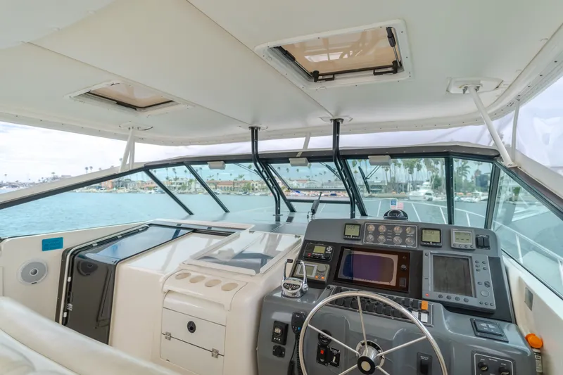 Slide: The Image of Interior view of 2004 Tiara Yachts 4000 helm station. - 27