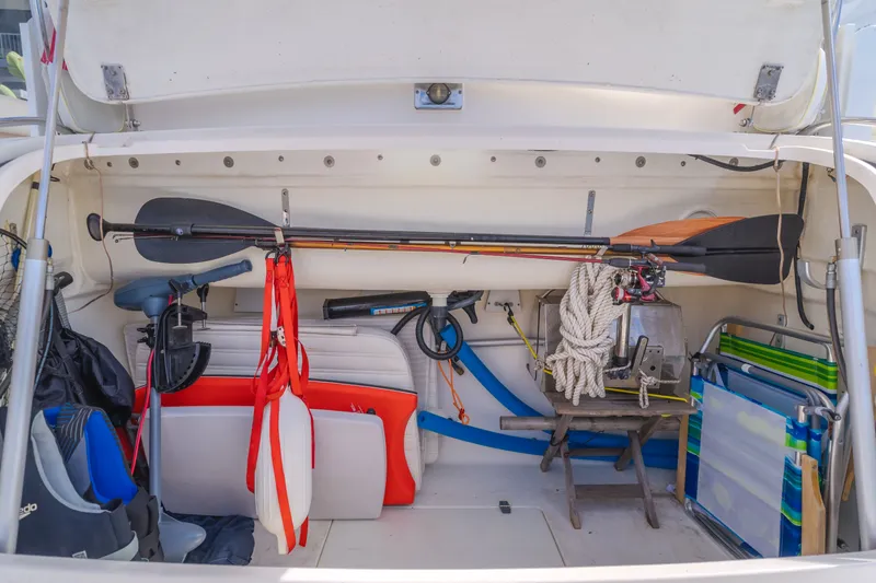 Slide: The Image of Storage area on a 2004 Tiara Yachts 4000 with fishing gear and accessories. - 36