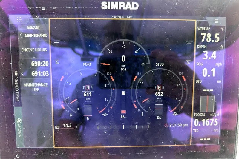 Slide: The Image of Simrad marine display showing engine data for 2014 Pro-Line 26 Super Sport boat. - 50