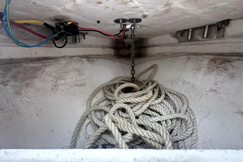 Slide: The Image of Anchor chain and rope storage in 2014 Pro-Line 26 Super Sport boat. - 60