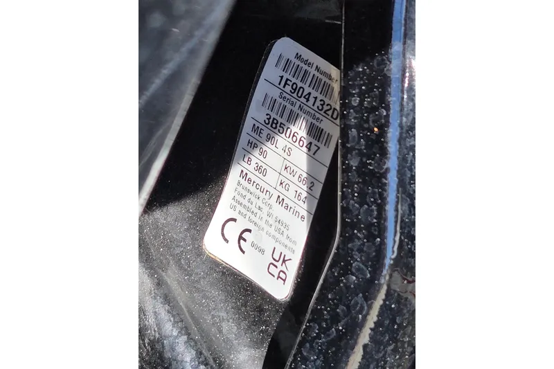 Slide: The Image of Label on 2025 Tracker Grizzly 1860 CC boat, displaying model and serial numbers. - 15