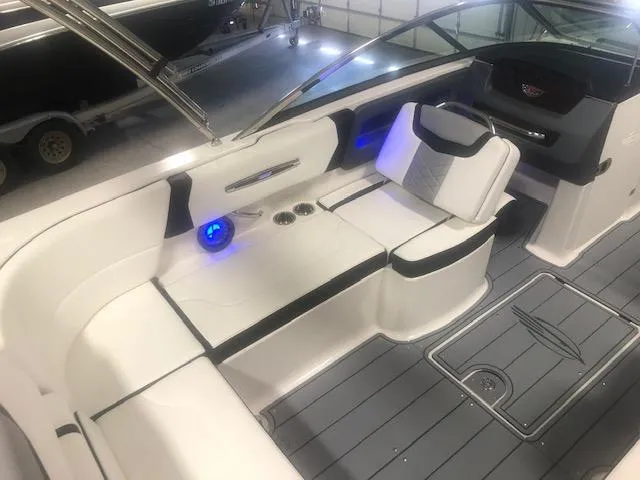 Slide: The Image of Interior of a 2022 Chaparral 247 SSX boat with luxurious features. - 12