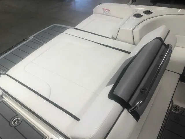 Slide: The Image of Rear view of 2022 Chaparral 247 SSX with white upholstery. - 13