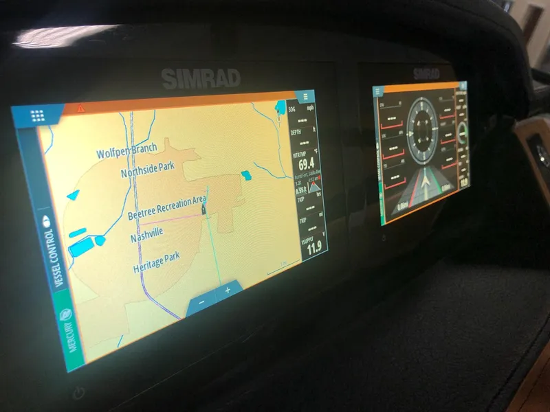 Slide: The Image of Simrad displays in Chaparral 247 SSX boat, year 2022. - 15