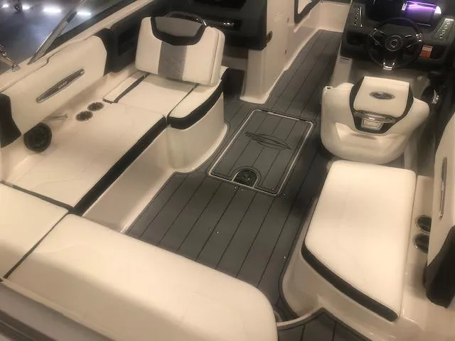 Slide: The Image of Interior of 2022 Chaparral 247 SSX with luxurious seating. - 5