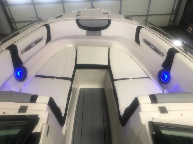 Slide: The Image of Interior view of 2022 Chaparral 247 SSX with blue LED lighting. - 6