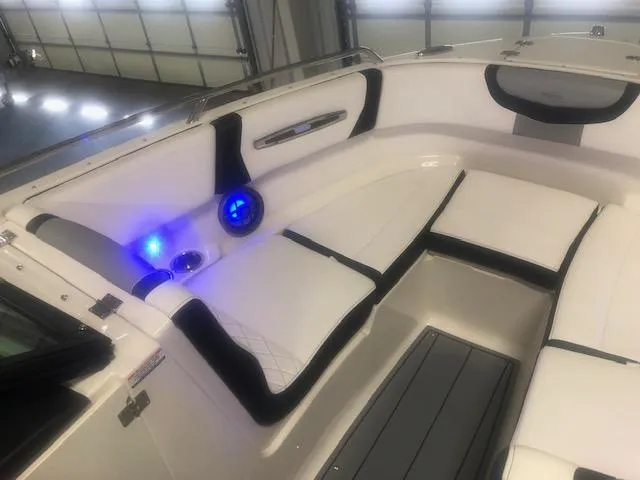 Slide: The Image of Interior of 2022 Chaparral 247 SSX with blue LED lighting. - 7