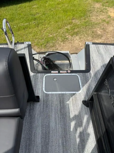 Slide: The Image of Interior of 2026 Bennington S Series 22 SSR with gray carpet flooring. - 11