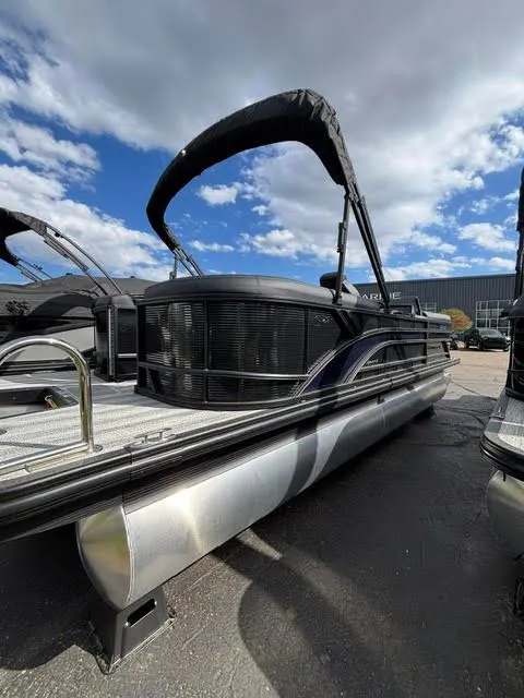 Slide: The Image of 2026 Bennington S Series 22 SSR pontoon boat under blue sky. - 14