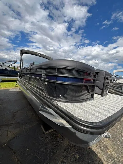 Slide: The Image of Bennington S Series 22 SSR pontoon boat, 2026, under blue sky. - 17