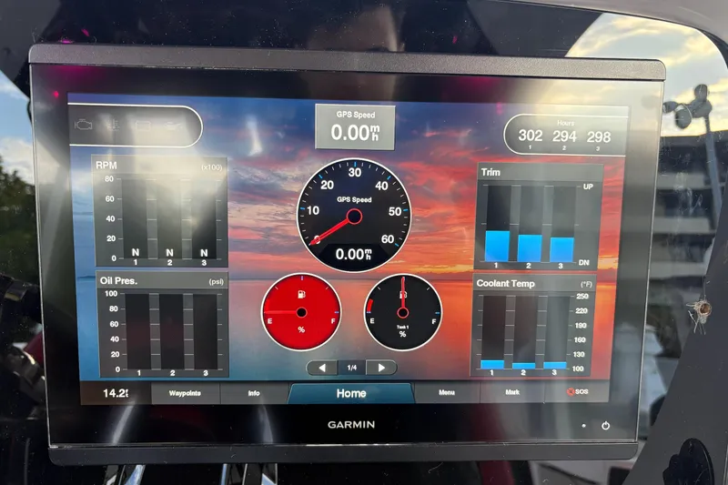 Slide: The Image of Garmin display on 2021 Renegade 33 showing RPM, GPS speed, and engine metrics. - 2