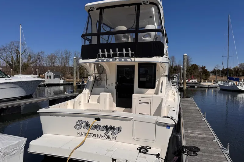 Slide: The Image of 2004 Silverton 38 Convertible yacht docked at Huntington Harbor, NY. - 4