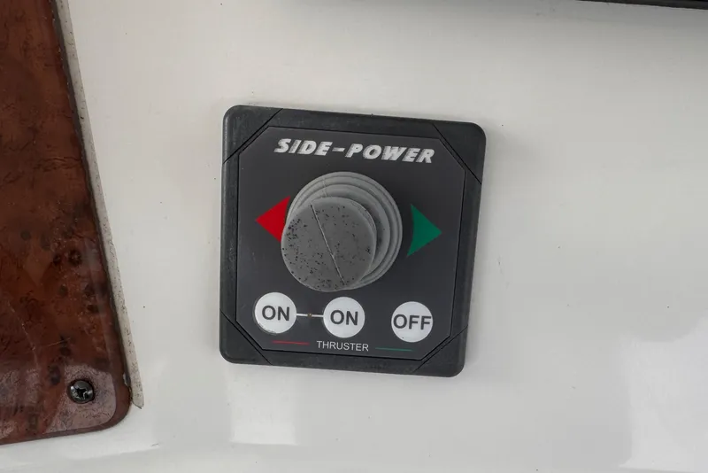 Slide: The Image of Side-Power thruster control panel on 2004 Silverton 38 Convertible boat. - 41