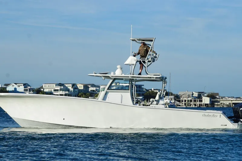 The Image of 2025 Onslow Bay 41 Tournament boat cruising on water, featuring Seakeeper technology. - 0
