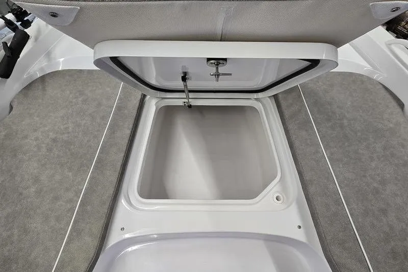 Slide: The Image of 2025 Sea Hunt BX 25 FS boat storage compartment, open and empty. - 10